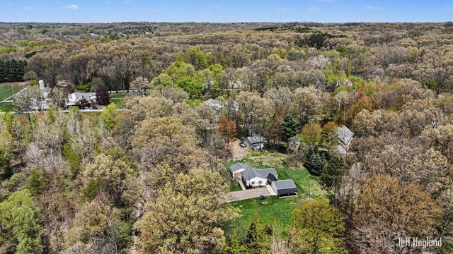 1260 Cramton Avenue NE, Ada, MI 49301