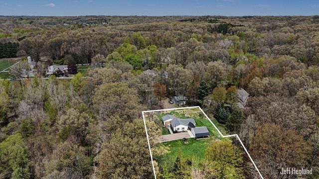 1260 Cramton Avenue NE, Ada, MI 49301