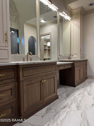 309 Sunset Palm Court, Youngsville, LA 70592