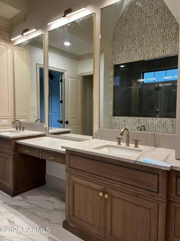 309 Sunset Palm Court, Youngsville, LA 70592