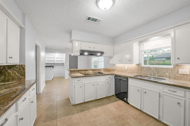 7611 Theisswood Road, Spring, TX 77379