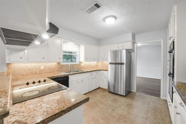 7611 Theisswood Road, Spring, TX 77379