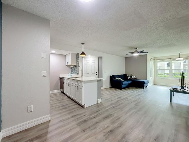 5144 CONROY ROAD 13, Orlando, FL 32811