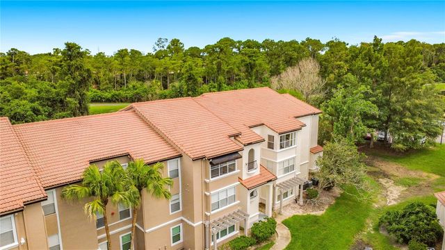 5144 CONROY ROAD 13, Orlando, FL 32811