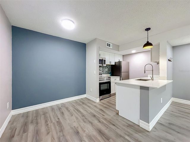 5144 CONROY ROAD 13, Orlando, FL 32811