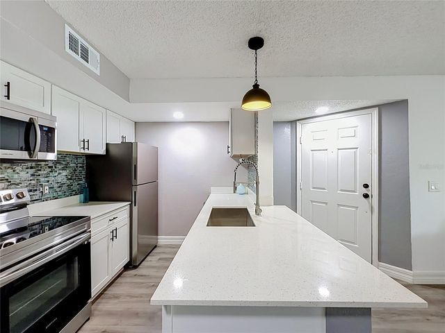 5144 CONROY ROAD 13, Orlando, FL 32811