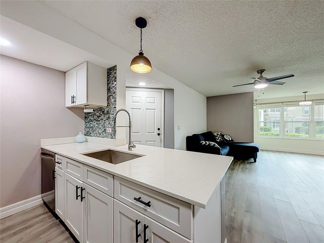 5144 CONROY ROAD 13, Orlando, FL 32811