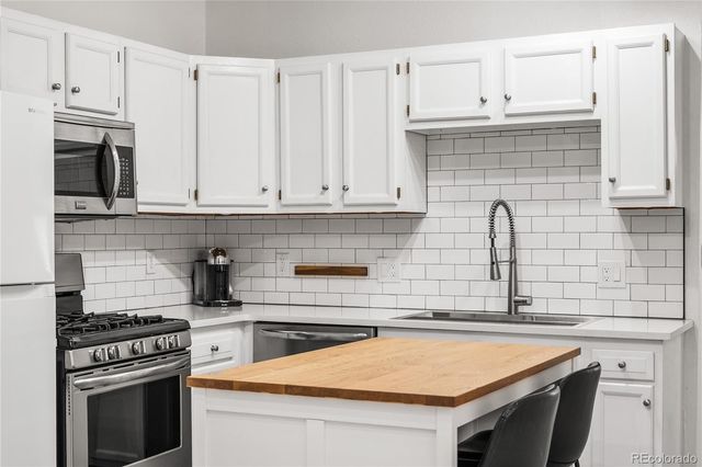 2465 W Caithness Place, Denver, CO 80211