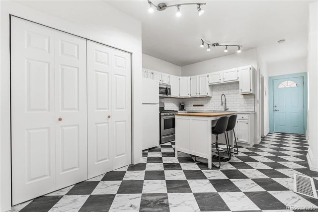 2465 W Caithness Place, Denver, CO 80211