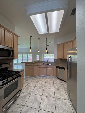 3210 Woodcreek Glen Lane, Houston, TX 77073