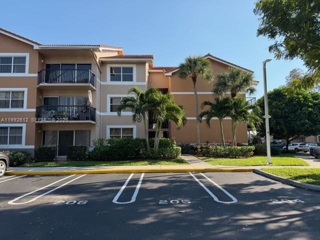 8901 Wiles Road 103, Coral Springs, FL 33067