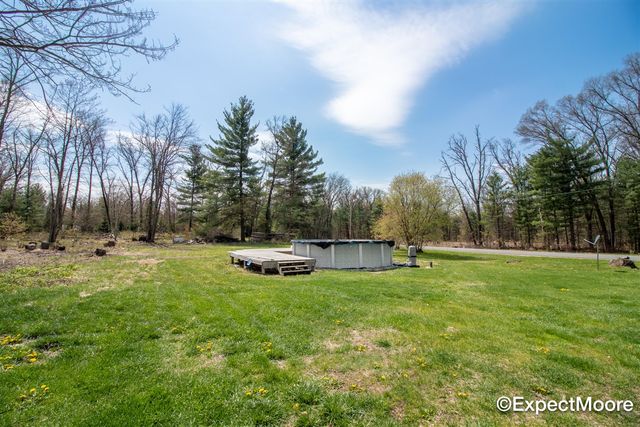 7890 N Maple Hill Road, Howard City, MI 49329