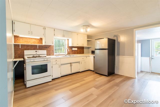 7890 N Maple Hill Road, Howard City, MI 49329