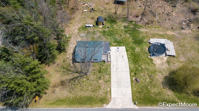 7890 N Maple Hill Road, Howard City, MI 49329