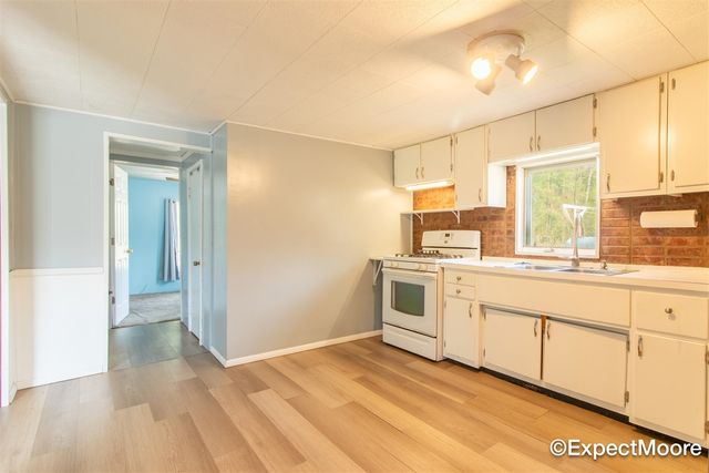 7890 N Maple Hill Road, Howard City, MI 49329