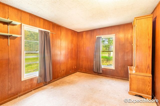 7890 N Maple Hill Road, Howard City, MI 49329
