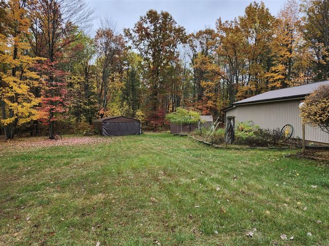 108 Deerwood Court, Roscommon, MI 48653