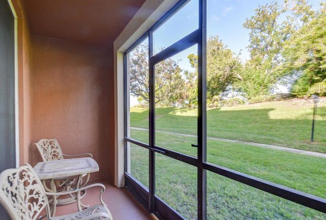 11770 St Andrews Place 105, Wellington, FL 33414