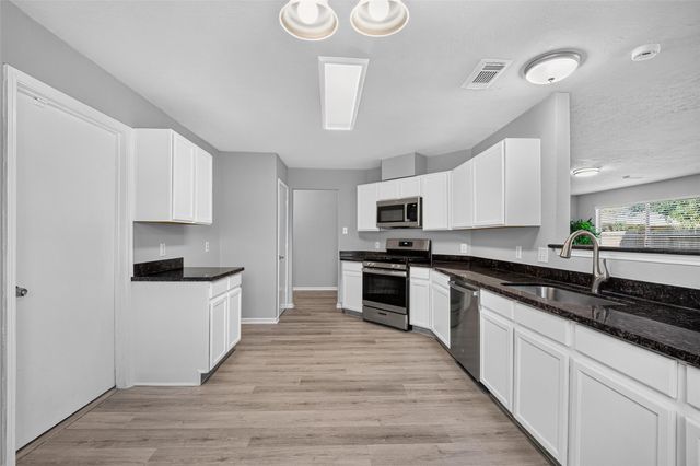 9711 Sutton Meadows Court, Houston, TX 77086