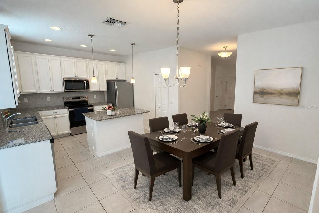 Image 6 of property listing at 6970 TUSSILAGO WAY, Orlando, FL 32822