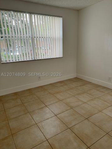 8801 Wiles Rd 103, Coral Springs, FL 33067