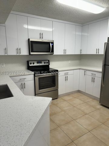 8801 Wiles Rd 103, Coral Springs, FL 33067
