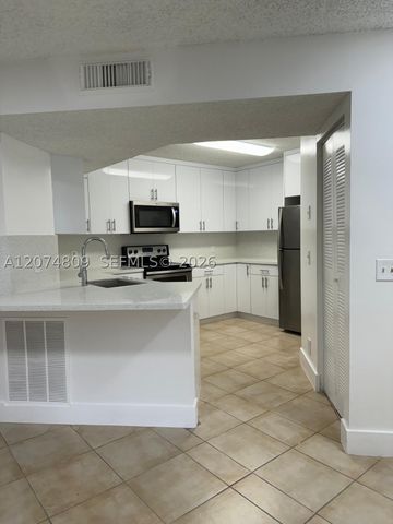 8801 Wiles Rd 103, Coral Springs, FL 33067