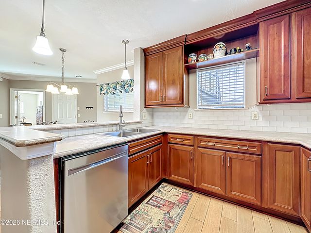 1800 THE GREENS Way 1801, Jacksonville Beach, FL 32250