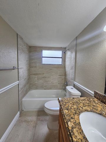 1421 WINDORAH Way A, West Palm Beach, FL 33411