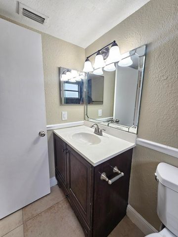 1421 WINDORAH Way A, West Palm Beach, FL 33411