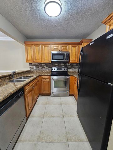 1421 WINDORAH Way A, West Palm Beach, FL 33411