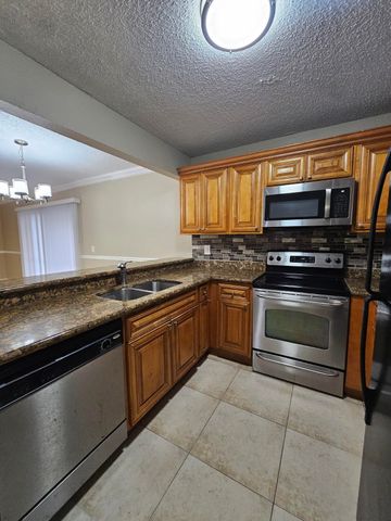 1421 WINDORAH Way A, West Palm Beach, FL 33411
