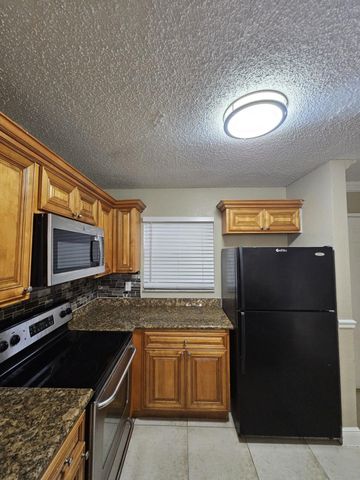 1421 WINDORAH Way A, West Palm Beach, FL 33411