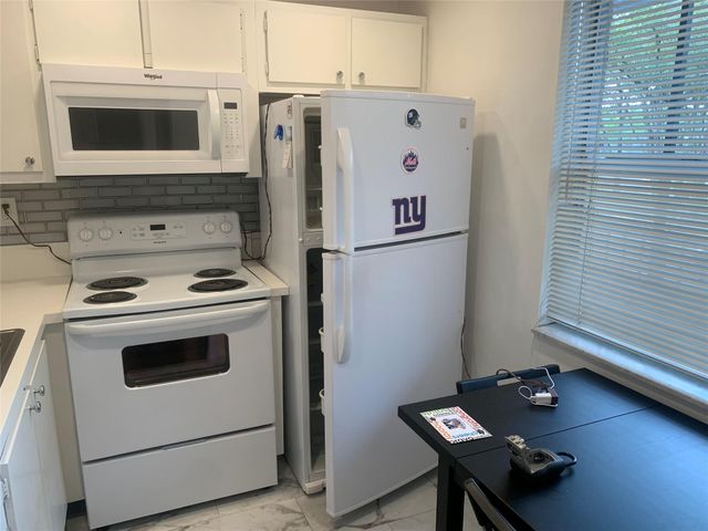 9081 Lime Bay Boulevard 214, Tamarac, FL 33321