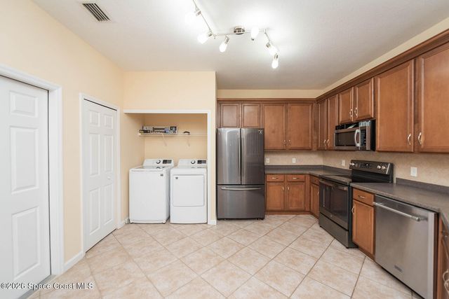 1921 Muirfield Way SE, Palm Bay, FL 32909