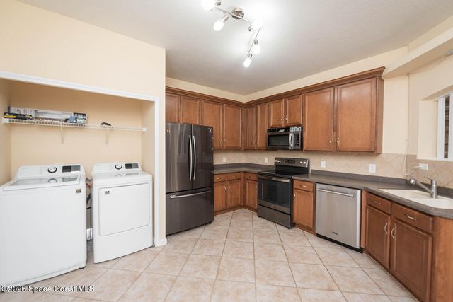 1921 Muirfield Way SE, Palm Bay, FL 32909