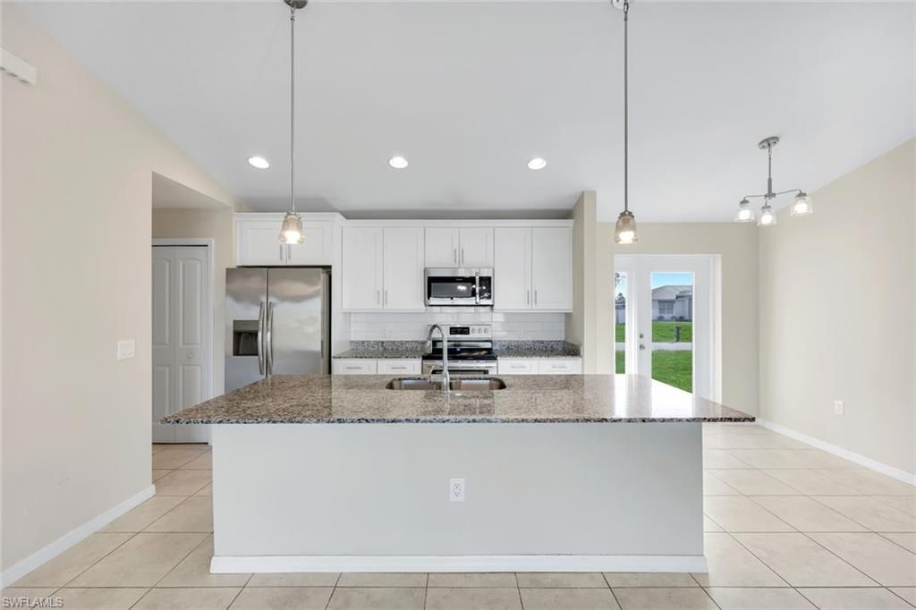 Image 11 of property listing at 1734 NW 6th PL, Cape Coral, FL 33993