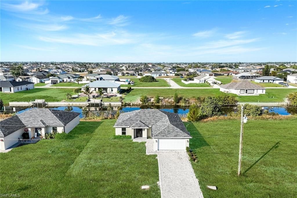 Image 2 of property listing at 1734 NW 6th PL, Cape Coral, FL 33993