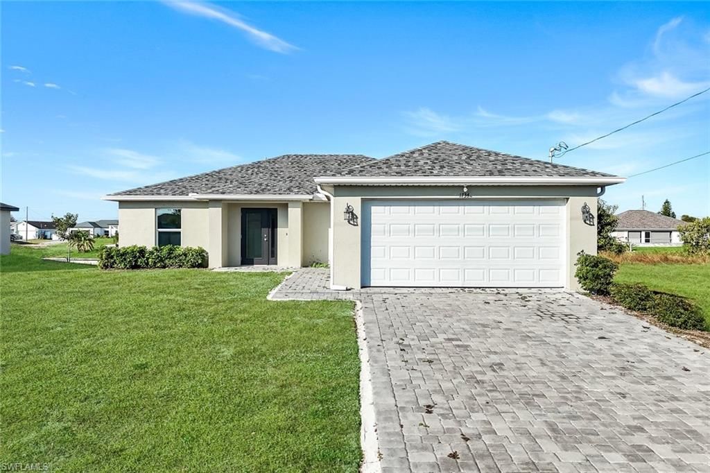 Image 3 of property listing at 1734 NW 6th PL, Cape Coral, FL 33993