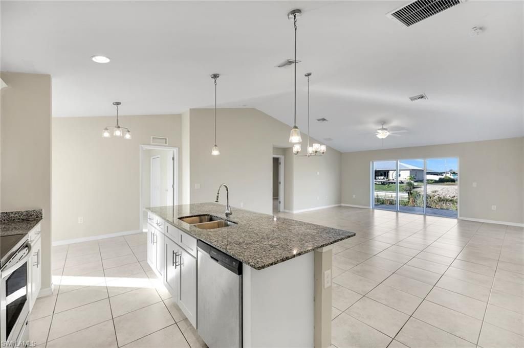 Image 9 of property listing at 1734 NW 6th PL, Cape Coral, FL 33993