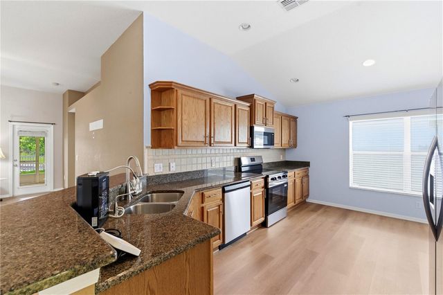 9551 JAYBIRD LANE, Land O Lakes, FL 34638