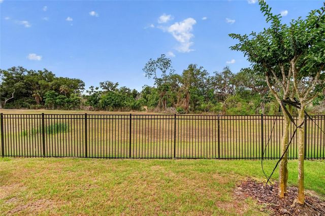 7050 RIPPLE POND LOOP, Zephyrhills, FL 33541