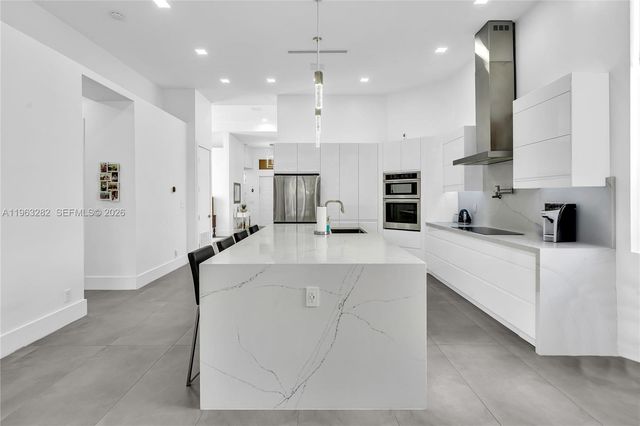 5851 NW 125th Ter, Coral Springs, FL 33076