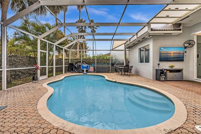 5851 NW 125th Ter, Coral Springs, FL 33076