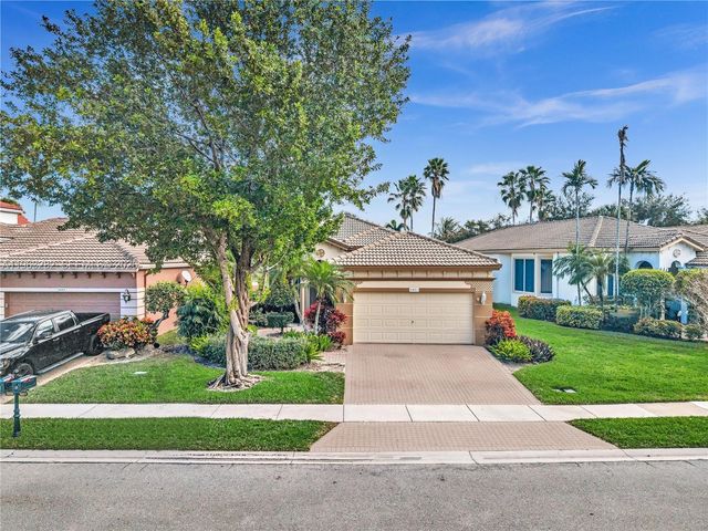 5851 NW 125th Ter, Coral Springs, FL 33076