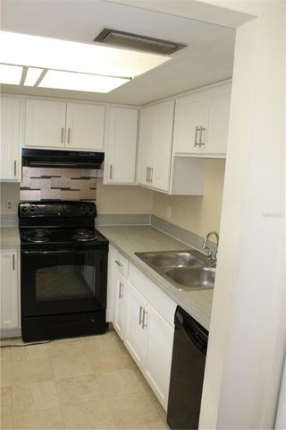 6306 NEWTOWN CIRCLE 6B4, Tampa, FL 33615