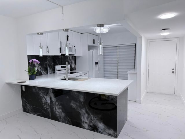 300 E Club Circle 107, Boca Raton, FL 33431