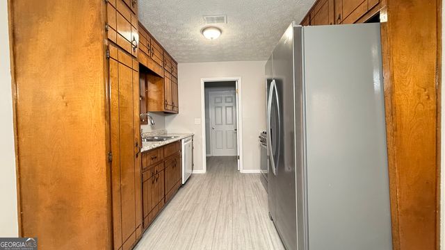 6928 Babbling Brook Drive, Rex, GA 30273