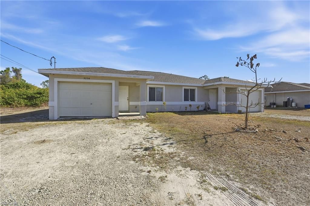 5234/5234 30th ST SW, LEHIGH ACRES, FL 33973 — photo 2