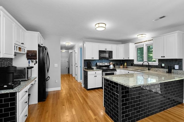 65 Woods Xing, Holliston, MA 01746